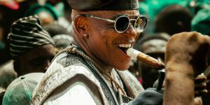 Colorful depiction of the Ojude Oba festival in Ijebu Ode, showcasing Yoruba attire and culture.